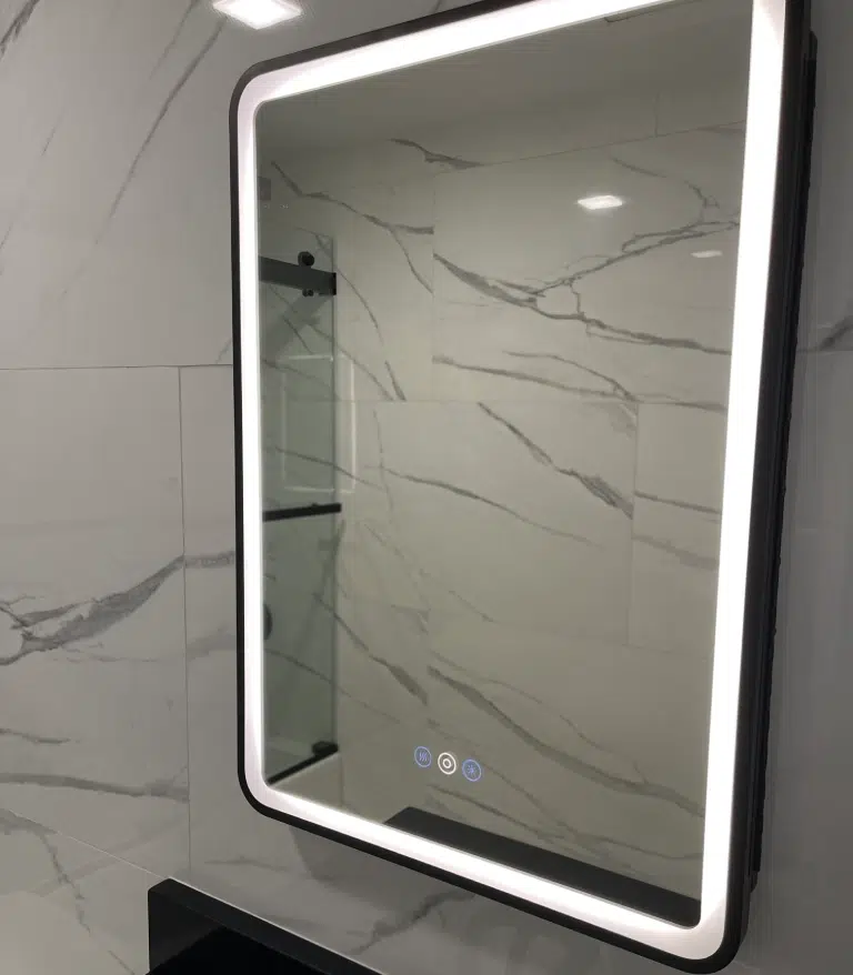 Rectangular frameless LED-backlit smart bathroom mirror with integrated touch controls.